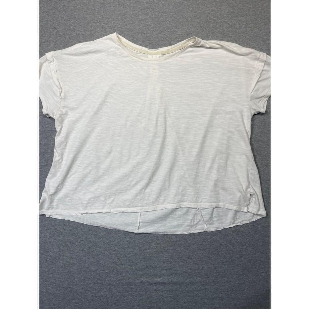 Good Hart cream colored shirt